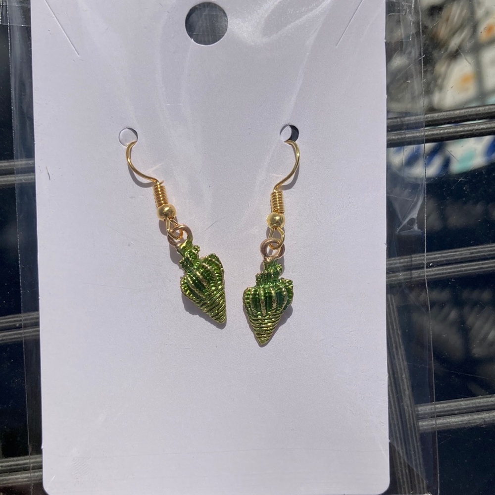 73.    “Seashell” earrings.